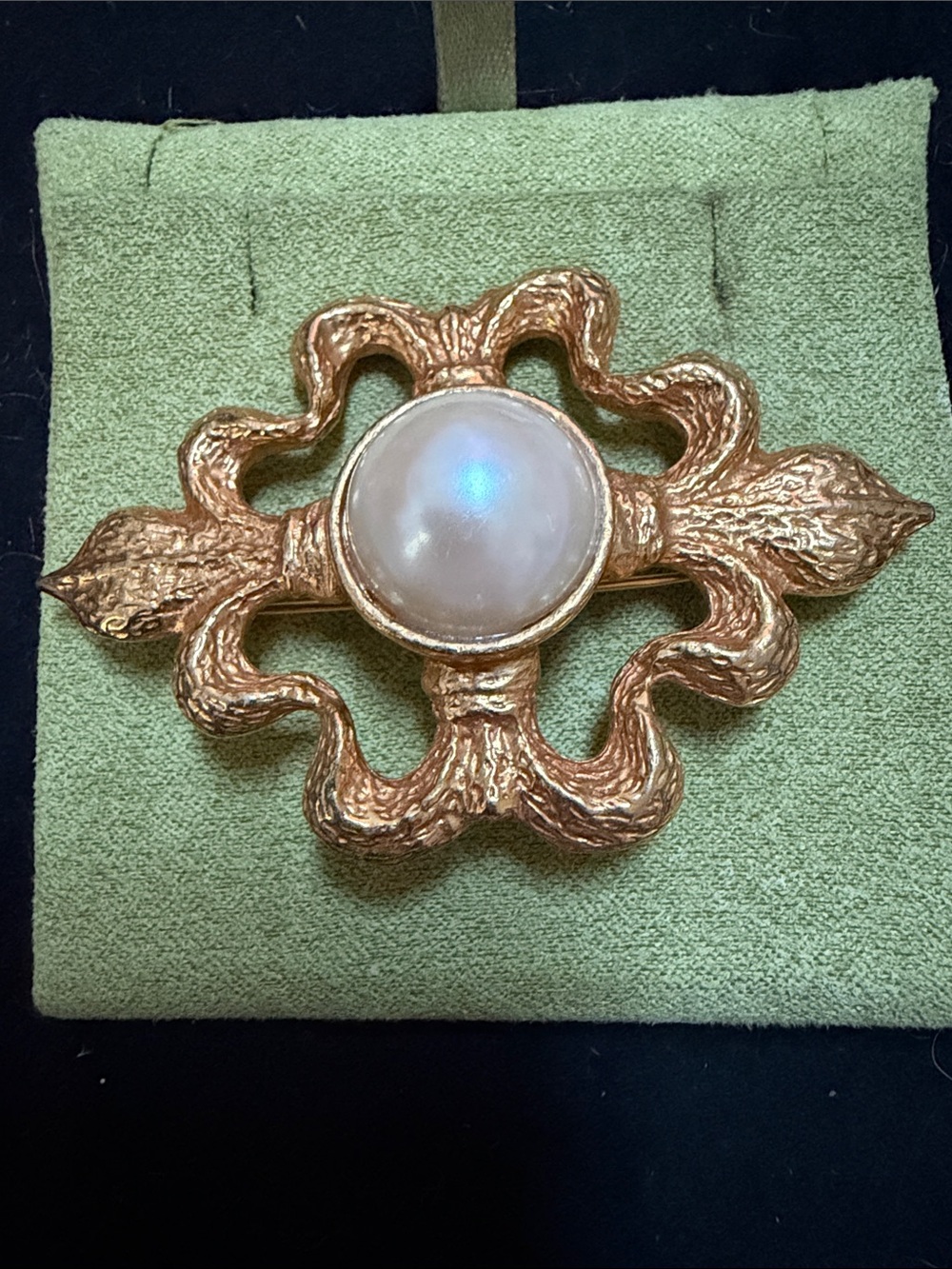 Maxine Denker. Elegant Gold-Tone Floral Brooch with Iridescent Center